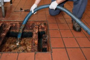 How Do You Know When You Need a Grease Trap Clean Out Service? 
